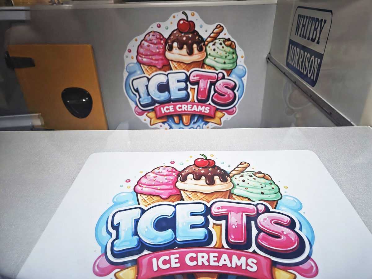 Ice T's Ice Creams branding and logo stickers inside the van in Northwich, Cheshire